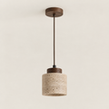 Suspension cylindre Ishi en travertin et bois couleur noyer, éteinte, sur fond clair